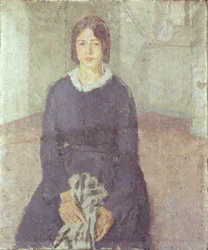 Mädchen in einem blauen Kleid, das ein Stück Näharbeit hält